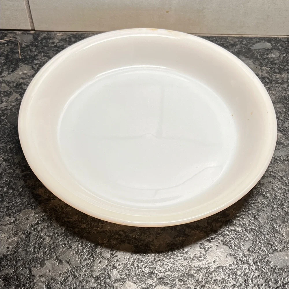 9” pie plate Peach Luster Fire King. Iridescent. Matches peach swirl casserole.